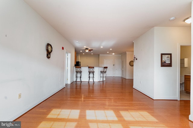 interior space with hardwood / wood-style floors and ceiling fan