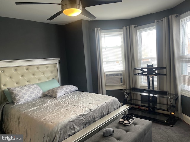 carpeted bedroom featuring cooling unit and ceiling fan