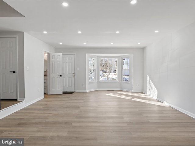 unfurnished room featuring light hardwood / wood-style flooring