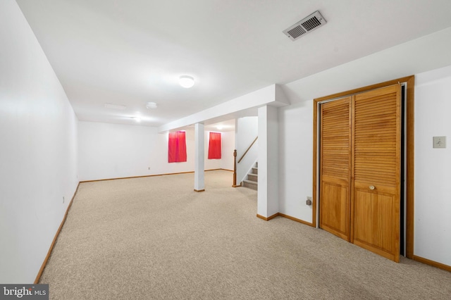 basement with light carpet