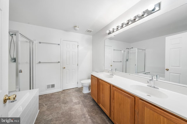 full bathroom with toilet, vanity, and separate shower and tub