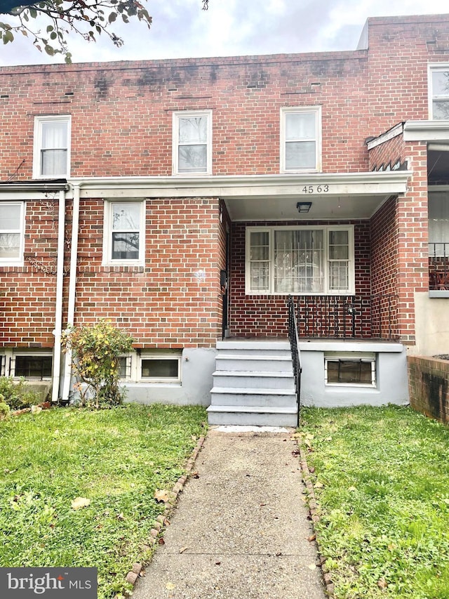 exterior space with a front lawn