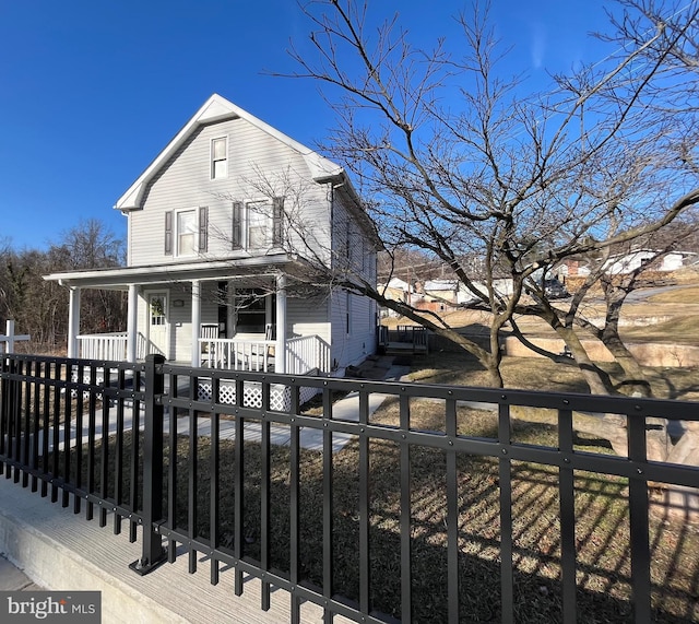 view of front of home featuring covered porch