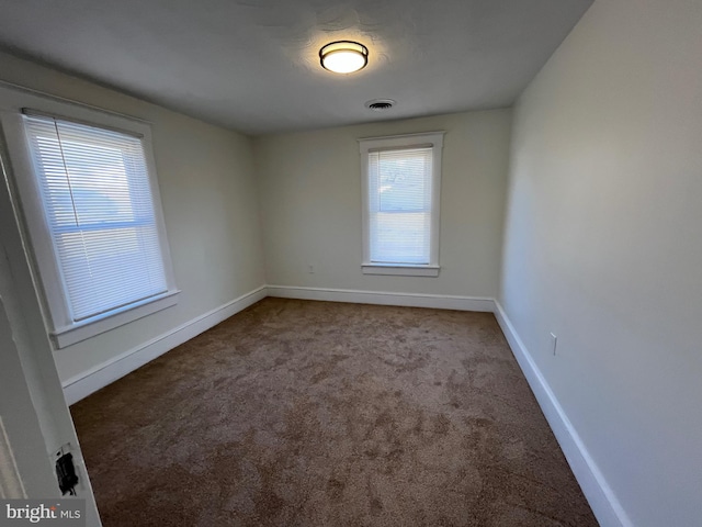 view of carpeted spare room