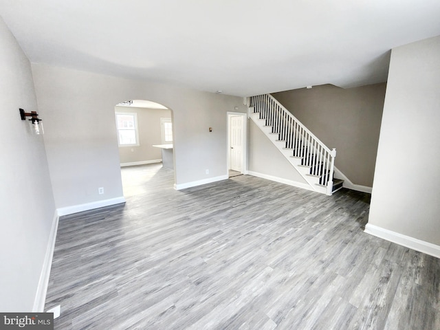 unfurnished living room with light wood-type flooring