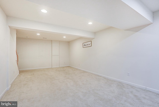 basement with light carpet