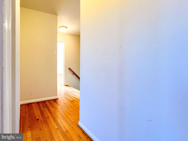 hallway featuring light hardwood / wood-style flooring