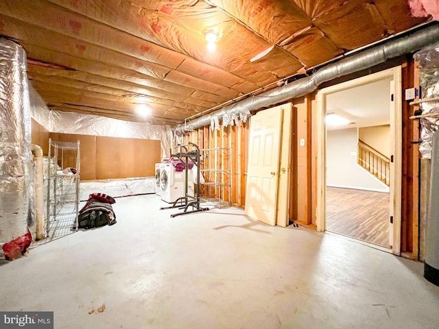 basement with washing machine and clothes dryer