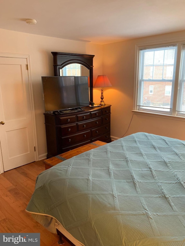 bedroom featuring hardwood / wood-style flooring