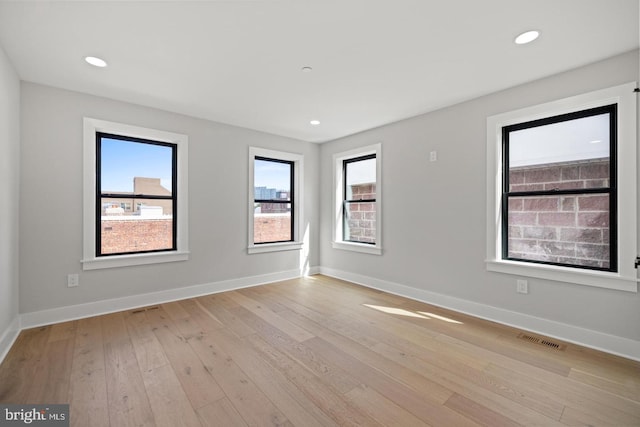 empty room featuring light hardwood / wood-style flooring