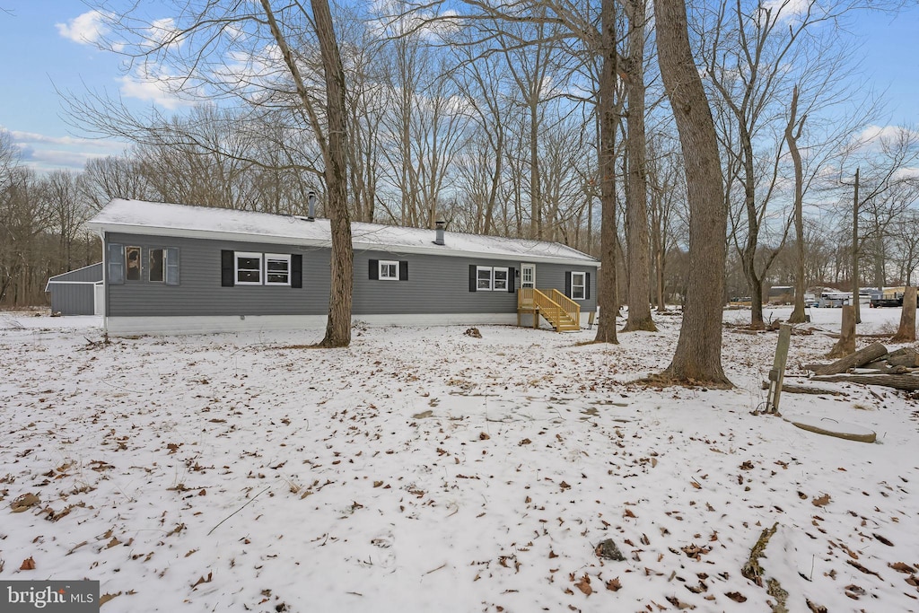 view of snow covered property