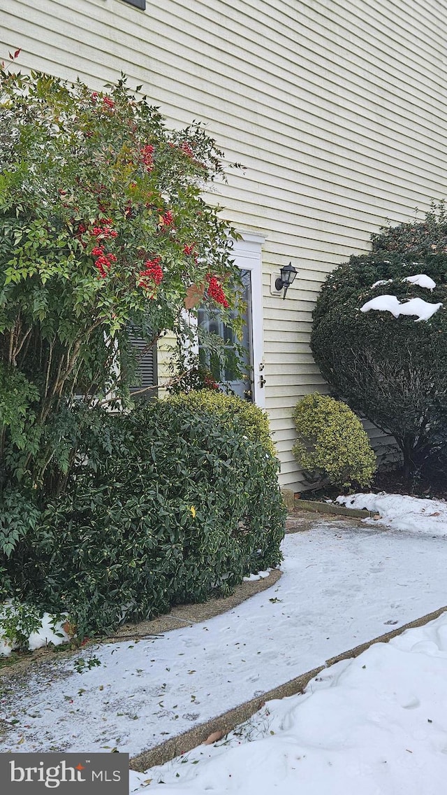 view of snow covered property