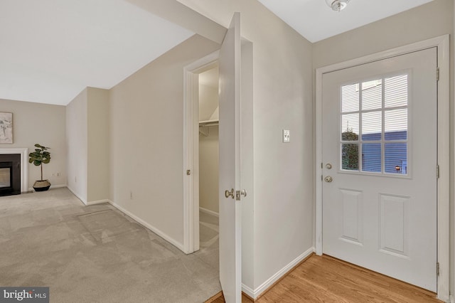 entrance foyer with light colored carpet