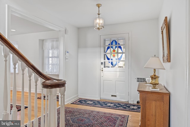 foyer entrance featuring hardwood / wood-style flooring