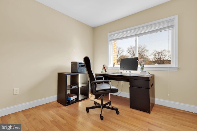 office space featuring light hardwood / wood-style floors