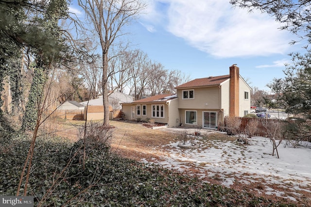 view of snow covered property