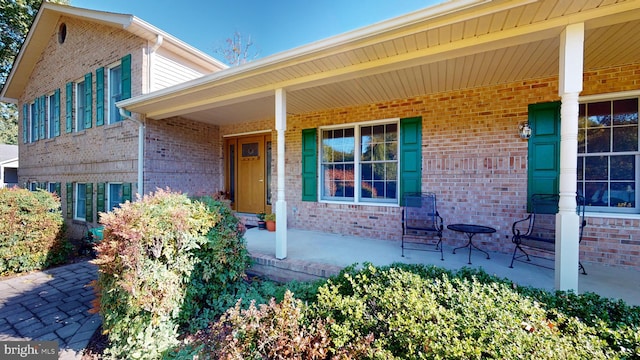 entrance to property with a porch