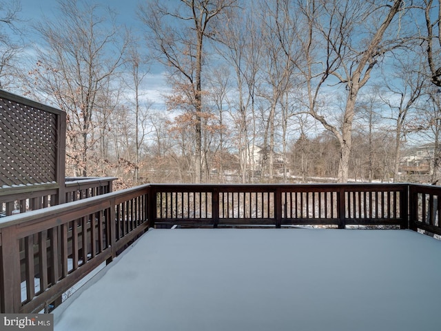 view of snow covered deck