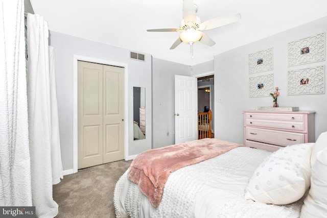 bedroom featuring light carpet, a closet, and ceiling fan