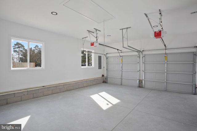 garage featuring a garage door opener