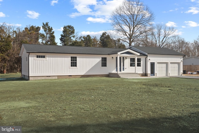 view of front of house featuring crawl space, a front yard, and an attached garage