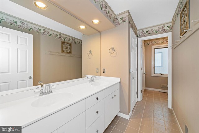 bathroom featuring tile patterned floors and vanity