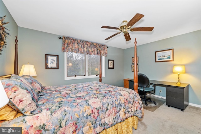 bedroom with ceiling fan and light carpet