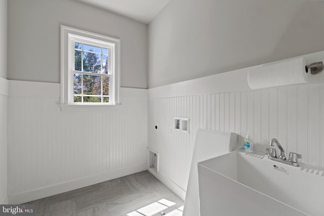 laundry area featuring washer hookup, sink, and electric dryer hookup