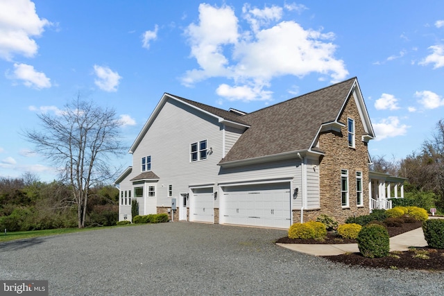 view of property exterior with a garage