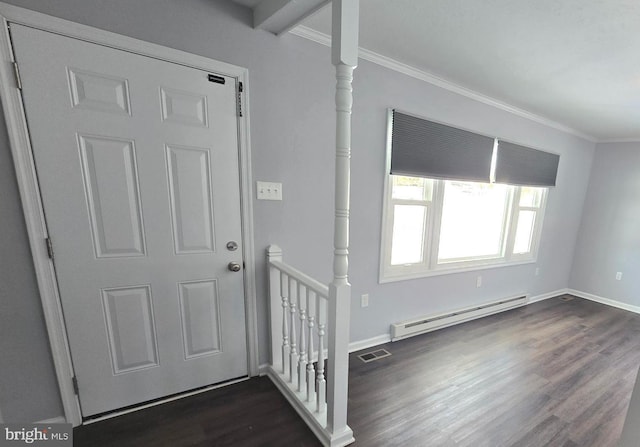 foyer entrance with crown molding, dark hardwood / wood-style floors, and a baseboard heating unit