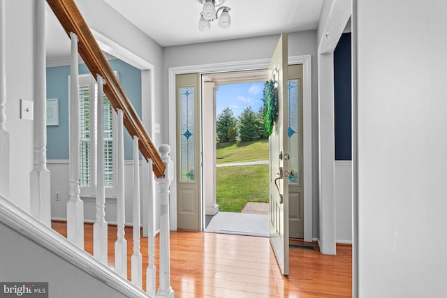 entrance foyer with light hardwood / wood-style flooring