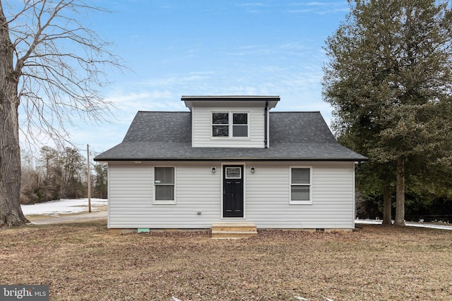 view of front of home featuring a front yard