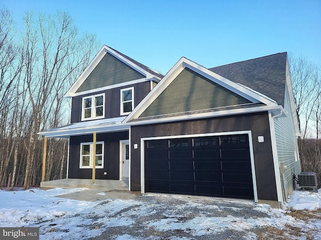 view of front of house featuring covered porch and central air condition unit