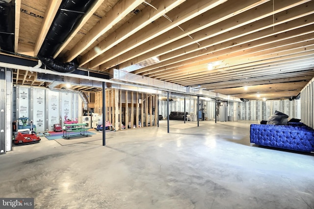 basement featuring gas water heater