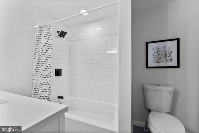 bathroom featuring shower / bath combo and toilet