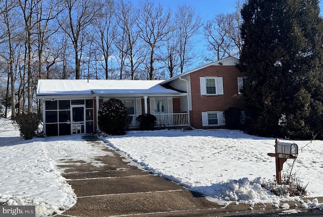 split level home with a sunroom