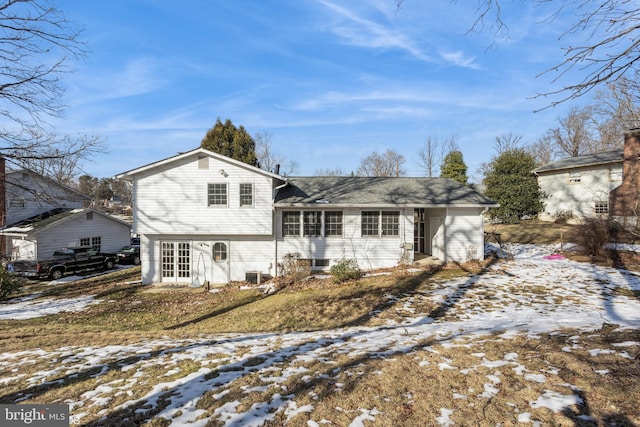 view of front of home featuring central AC unit