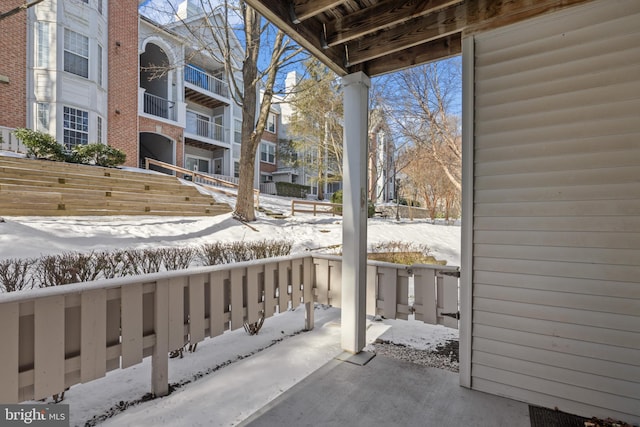 view of snow covered patio