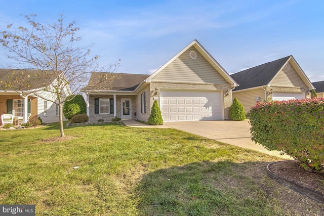 view of front of property featuring a garage and a front lawn