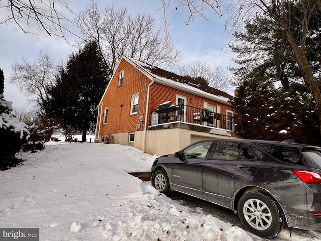 view of snow covered property