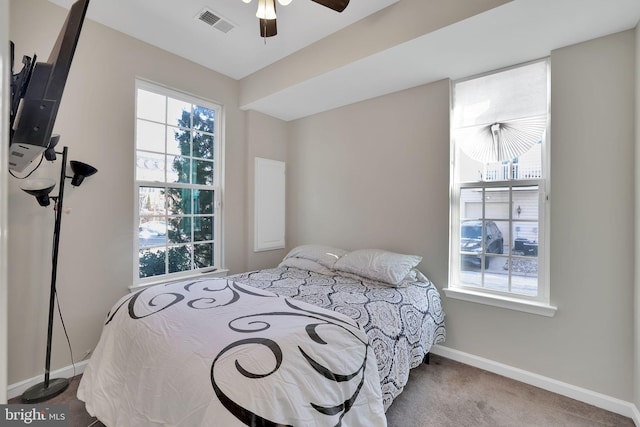 carpeted bedroom featuring ceiling fan