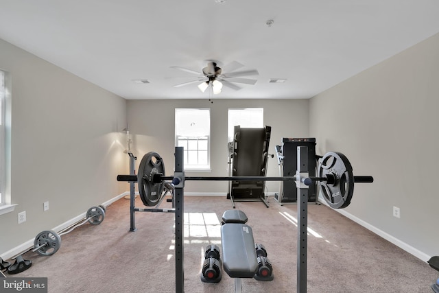 workout area featuring ceiling fan