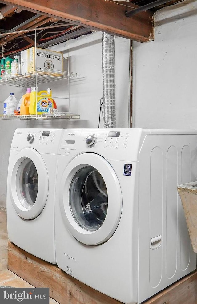 laundry room with washer and clothes dryer