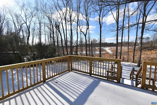 view of snow covered deck