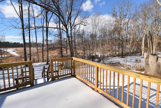 view of snow covered deck