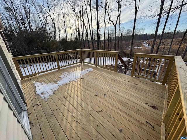 view of snow covered deck