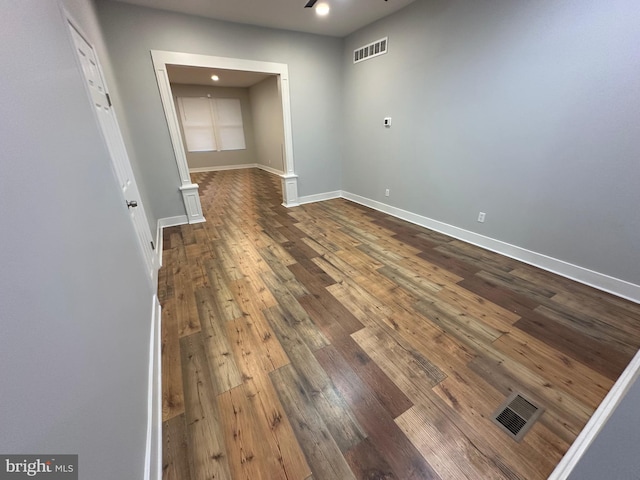 unfurnished room featuring hardwood / wood-style floors