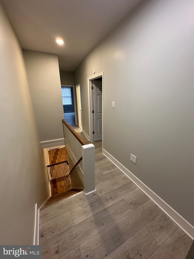 hall with light wood-type flooring