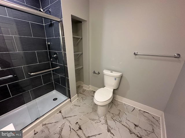 bathroom with toilet and walk in shower