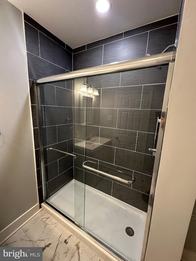 bathroom featuring walk in shower